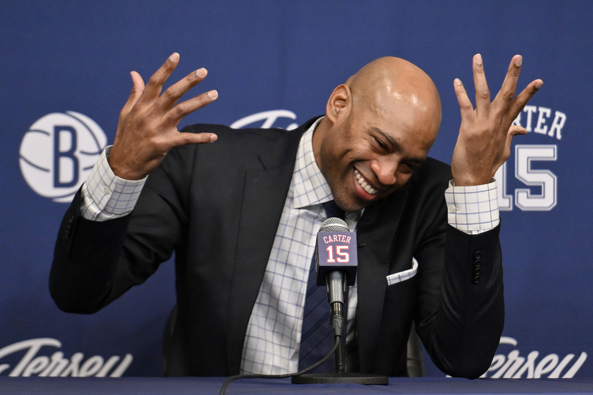 Jan 25, 2025; Brooklyn, New York, USA; Former NBA star Vince Carter speaks at a jersey retirement press conference before a game between the Brooklyn Nets and the Miami Heat at Barclays Center. Mandatory Credit: John Jones-Imagn Images - Source: Imagn