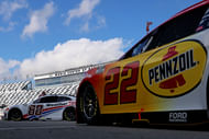 Joey Logano (22) and Shane Van Gisbergen (88) during Daytona 500 practice. Source: Imagn