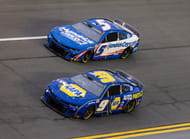 Chase Elliott (9) races alongside teammate Kyle Larson (5) during the Daytona 500. Source: Imagn