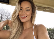 Paige Spiranac shares a striking all-white look from her latest golf outing