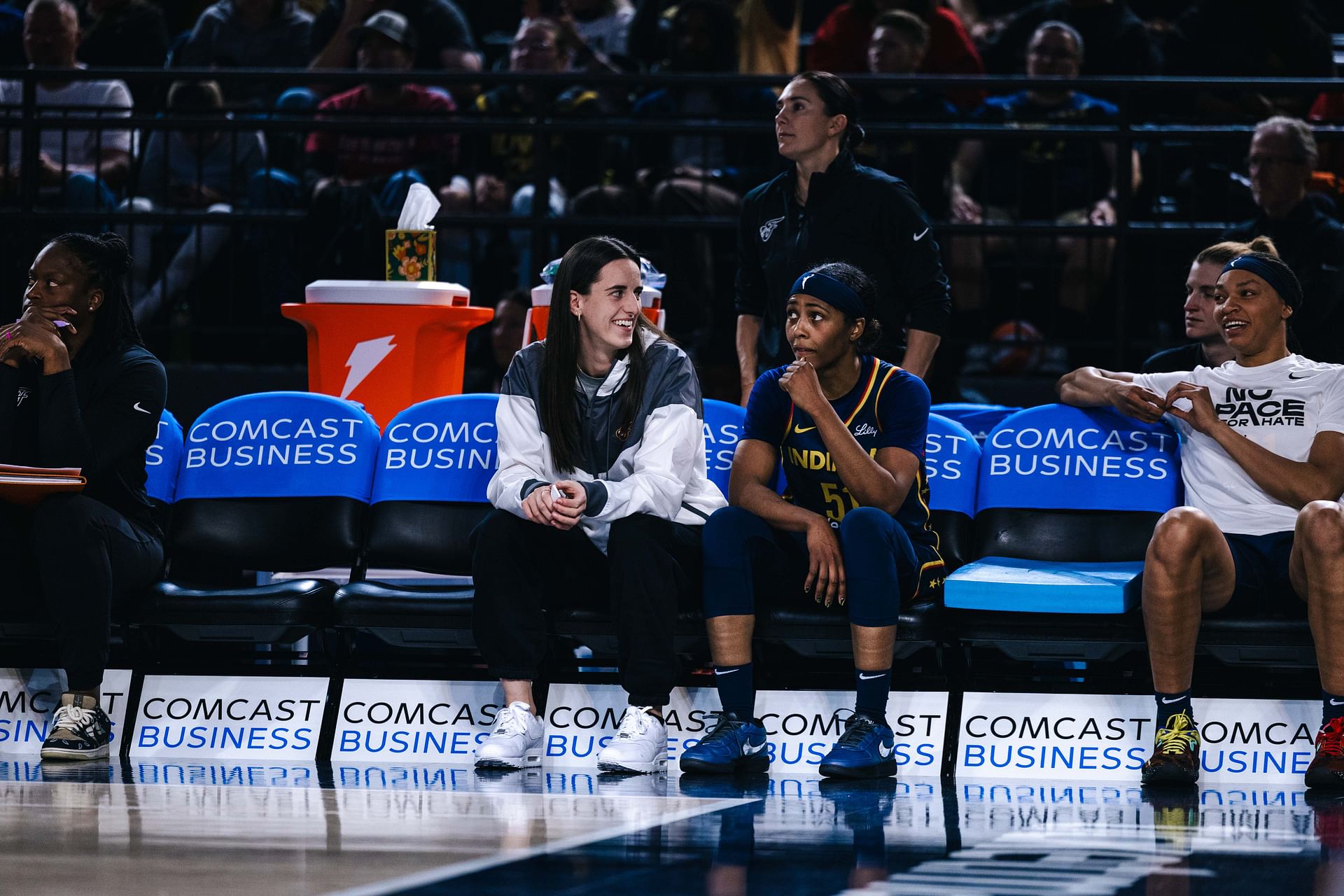 Cait sending mixed messages: Fans in disbelief over Caitlin Clarks reaction to Sydney Colson removing her shirt during wild celly