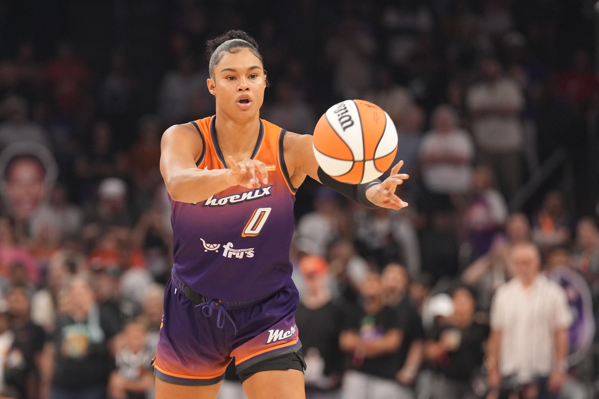 Jun 27, 2025; Phoenix, Arizona, USA; Phoenix Mercury forward Satou Sabally (0) passes the ball against the New York Liberty during the first half at Footprint Center. Mandatory Credit: Joe Camporeale-Imagn Images - Source: Imagn