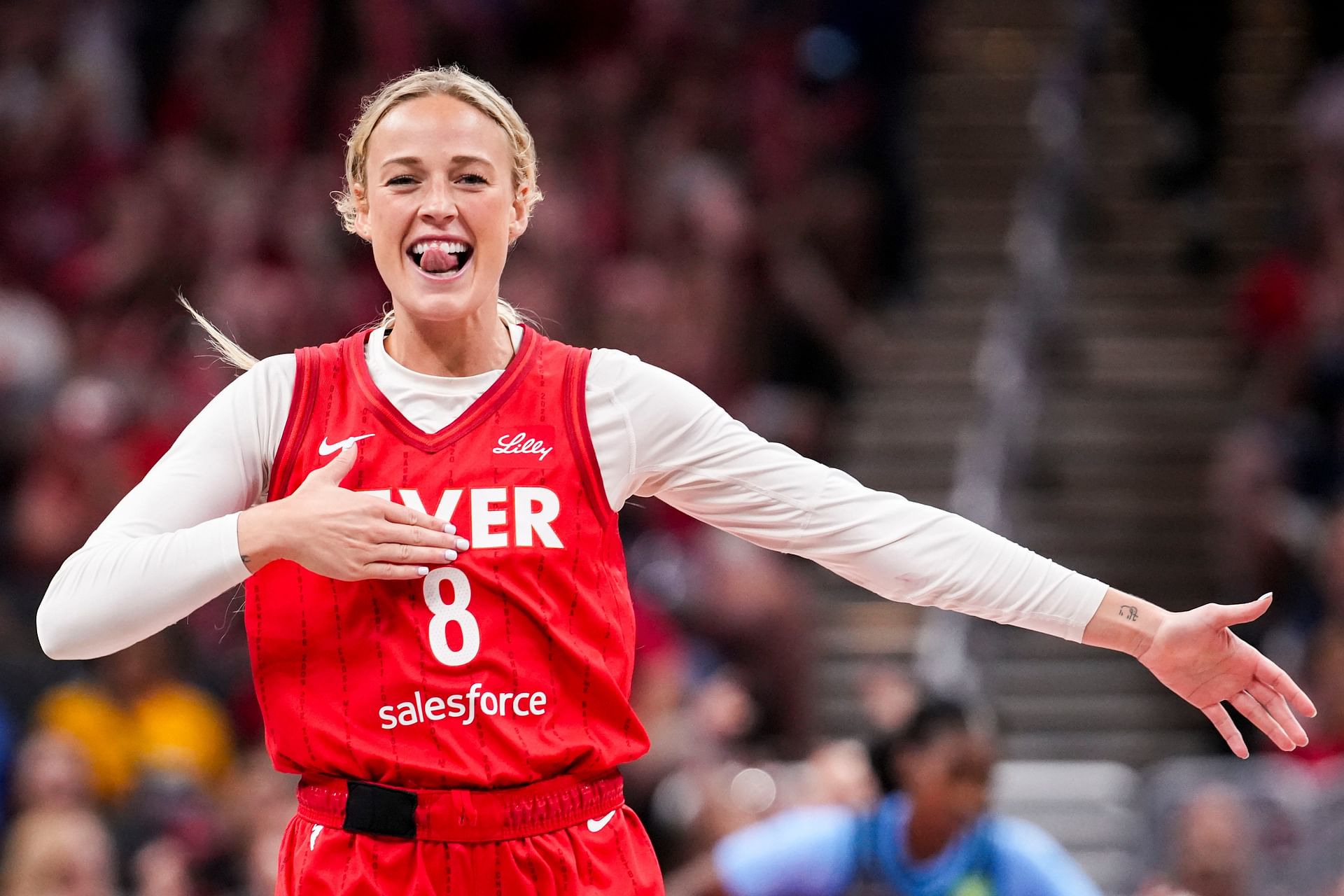 Indiana Fever guard Sophie Cunningham (8) celebrates Friday, July 11, 2025, during a game between the Indiana Fever and the Atlanta Dream at Gainbridge Fieldhouse in Indianapolis. The Indiana Fever defeated the Atlanta Dream, 99-82. - Source: Imagn
