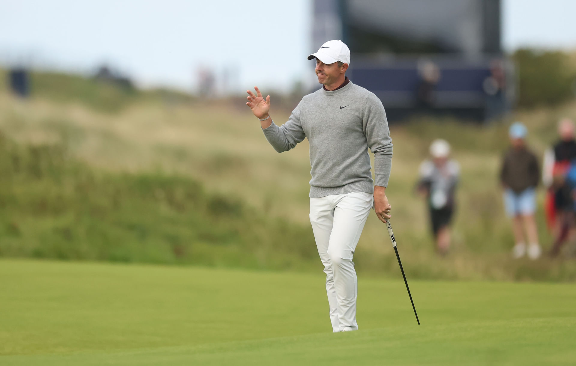 Rory McIlroy reacts to his shot on the 18th hole at the 2025 Open Championship - Image Source: Imagn