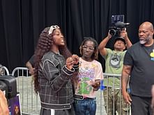 $1,500,000 NIL valued Flau'jae Johnson's mom Kia Brooks reacts to moments from her daughter's giveaway event