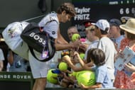 Fritz signs autographs at The Championships - Wimbledon 2025. - Source: Getty