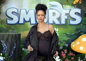 "This just gives Jaden & Willow type vibes" — Rihanna's kids RZA and Riot reacting to the paparazzi at "Smurfs" premiere warms the internet's heart