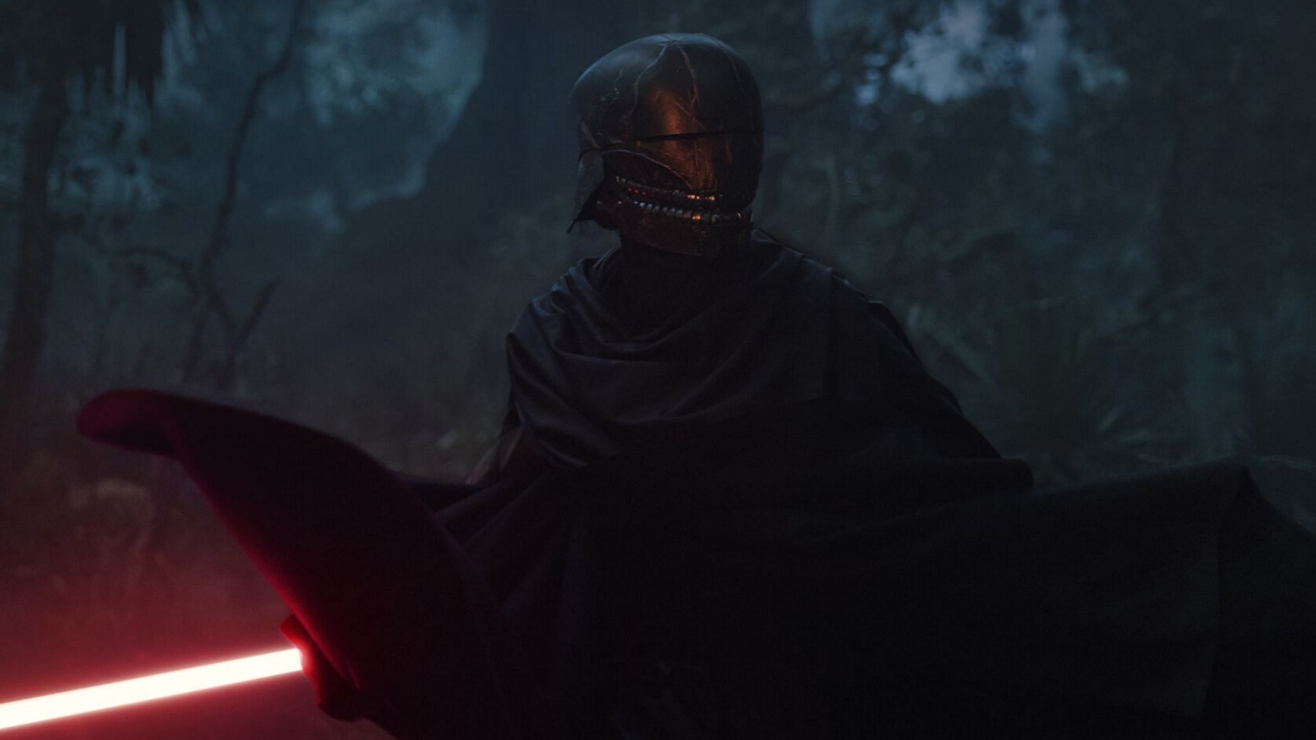 The Stranger wears a helmet that sports a frightful grin (Image via Official Website)