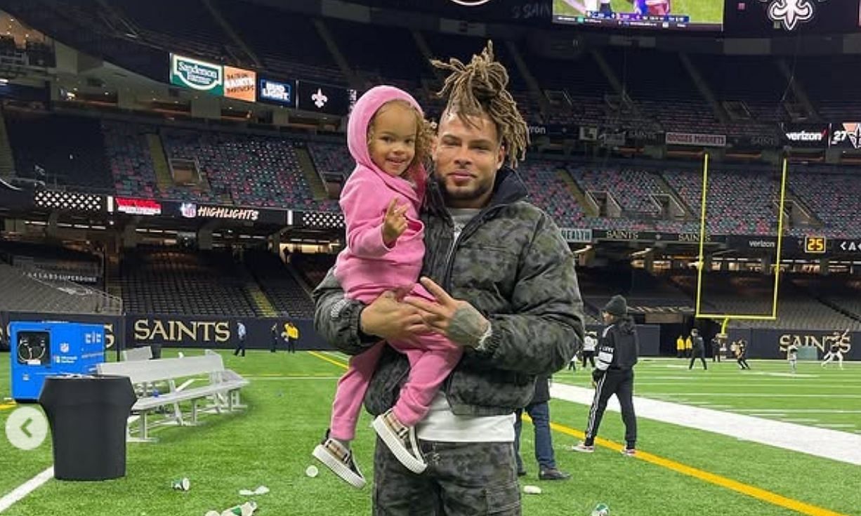 Tyrann Mathieu with his daughter. [Image credits: The star