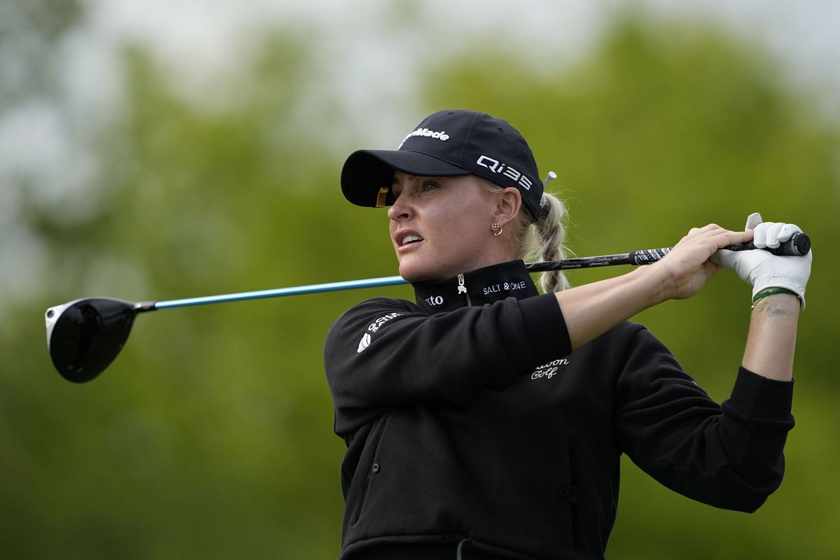 Charley Hull rocks a cropped jacket as she practices her swing ahead of the 2025 KPMG Women's Irish Open