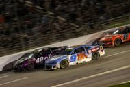 Alex Bowman, Chase Elliott, and Brad Keselowski race during the NASCAR Cup Series Quaker State 400 Available at Walmart at Echo Park Speedway - Source: Getty