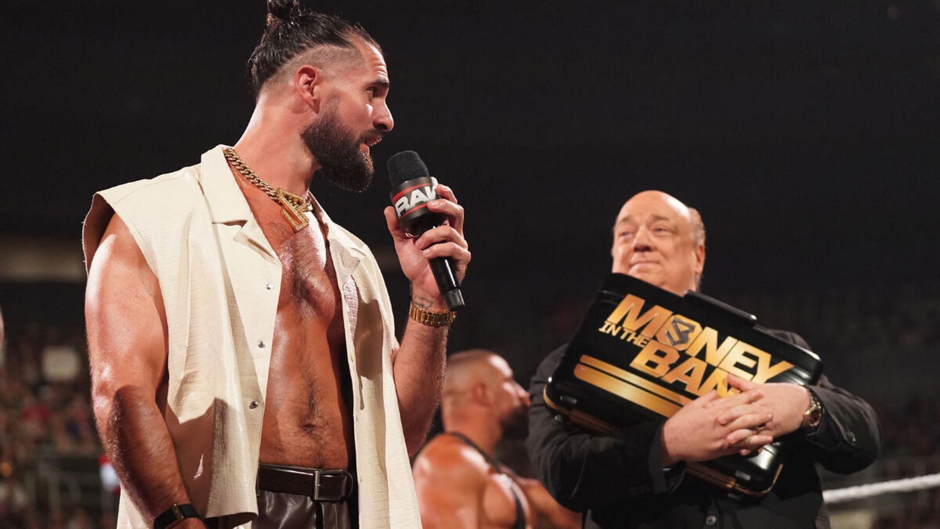 Seth Rollins and Paul Heyman (Image Credits: WWE.com)
