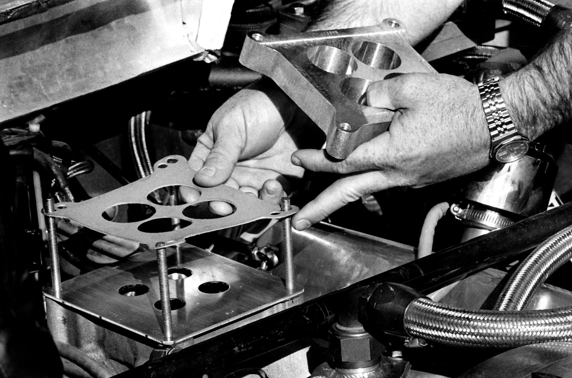 NASCAR racing team installs a restrictor plate before the 1988 Daytona 500. Source: Getty