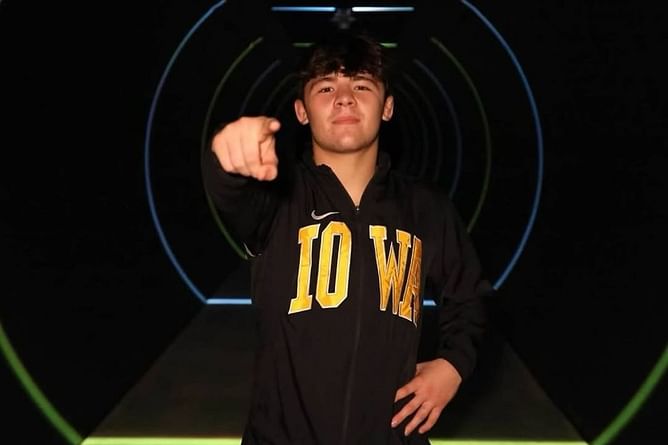Bo Bassett shows off special golden ticket after winning National Title at the US Marine Corps Junior Championships