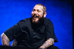 What happened at Post Malone’s Arizona concert? Mid-toast tumble incident explained