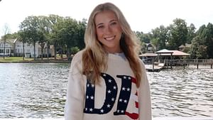 Erin Blaney styles her 4th of July weekend look with a white bikini top and matching shorts