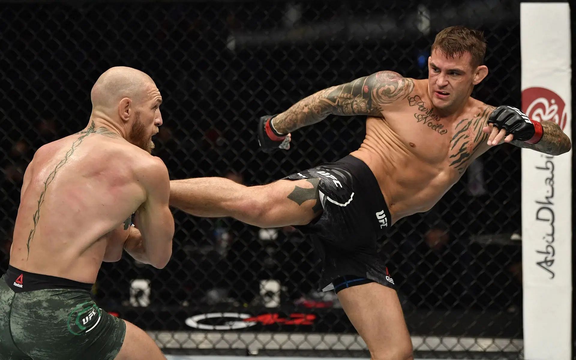 Dustin Poirier (right) is pleased with his victory against Conor McGregor (left) at UFC 257. [Image courtesy: Getty]