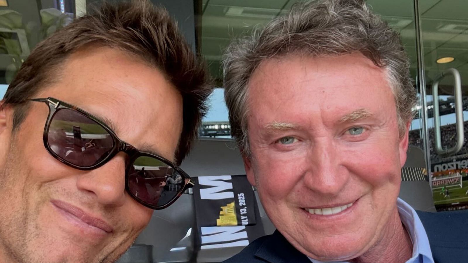 Tom Brady calls on Tie Domi as he links up with Wayne Gretzky at the FIFA Club World Cup Final