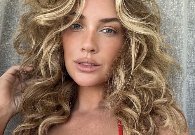 Paige Spiranac rocks $118 candy red tennis outfit in latest range post