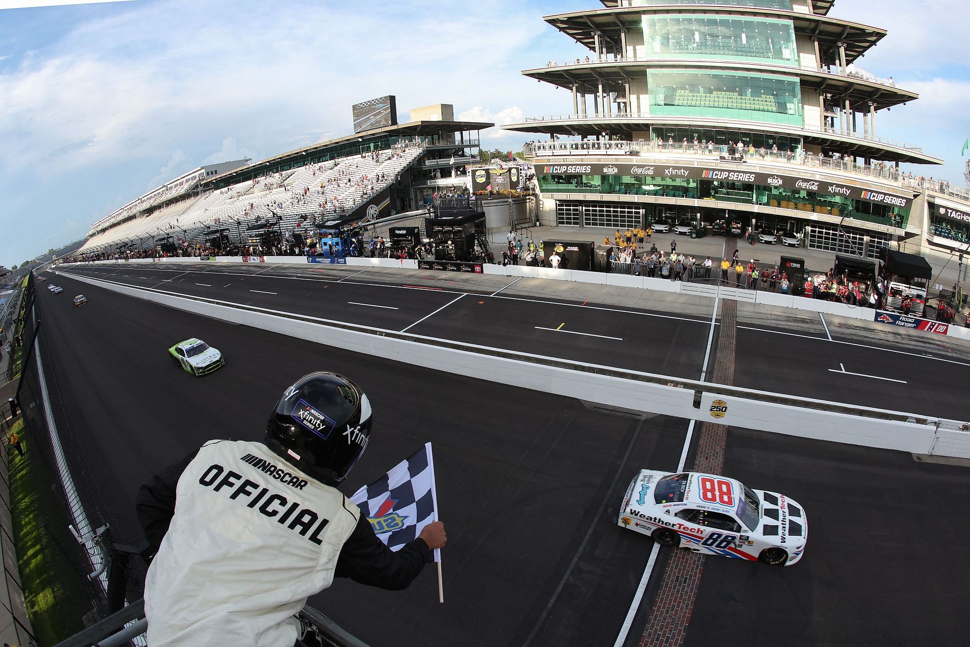 Connor Zilisch takes the checkered flag in the NASCAR Xfinity Series Pennzoil 250. Source: Getty