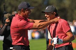 Tiger Woods & Charlie Woods share a laugh after the latter's impressive putt at Pinehurst CC
