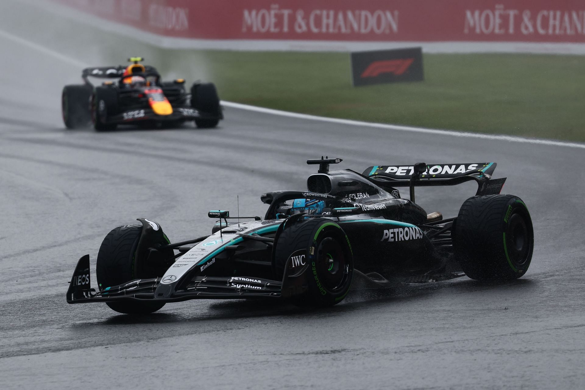 George Russell of Mercedes and Yuki Tsunoda of Red Bull Racing ahead of the Formula 1 Belgian Grand Prix at Spa-Francorchamps in Spa, Belgium on July 27, 2025 - Source: Getty
