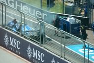 Carlos Sainz's (55) Williams FW47 Mercedes catches fire in the pit lane at the Red Bull Ring. Source: Getty