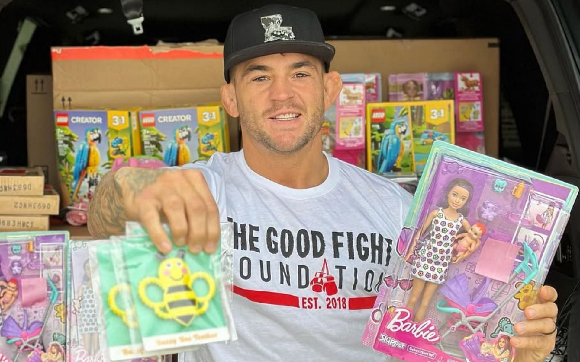 Dustin Poirier (pictured) during one of The Good Fight Foundation