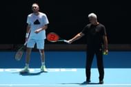 Stefanos Tsitsipas (left) being coached by father Apostolos Tsitsipas (right) at the 2024 Australian Open (Source: Getty)
