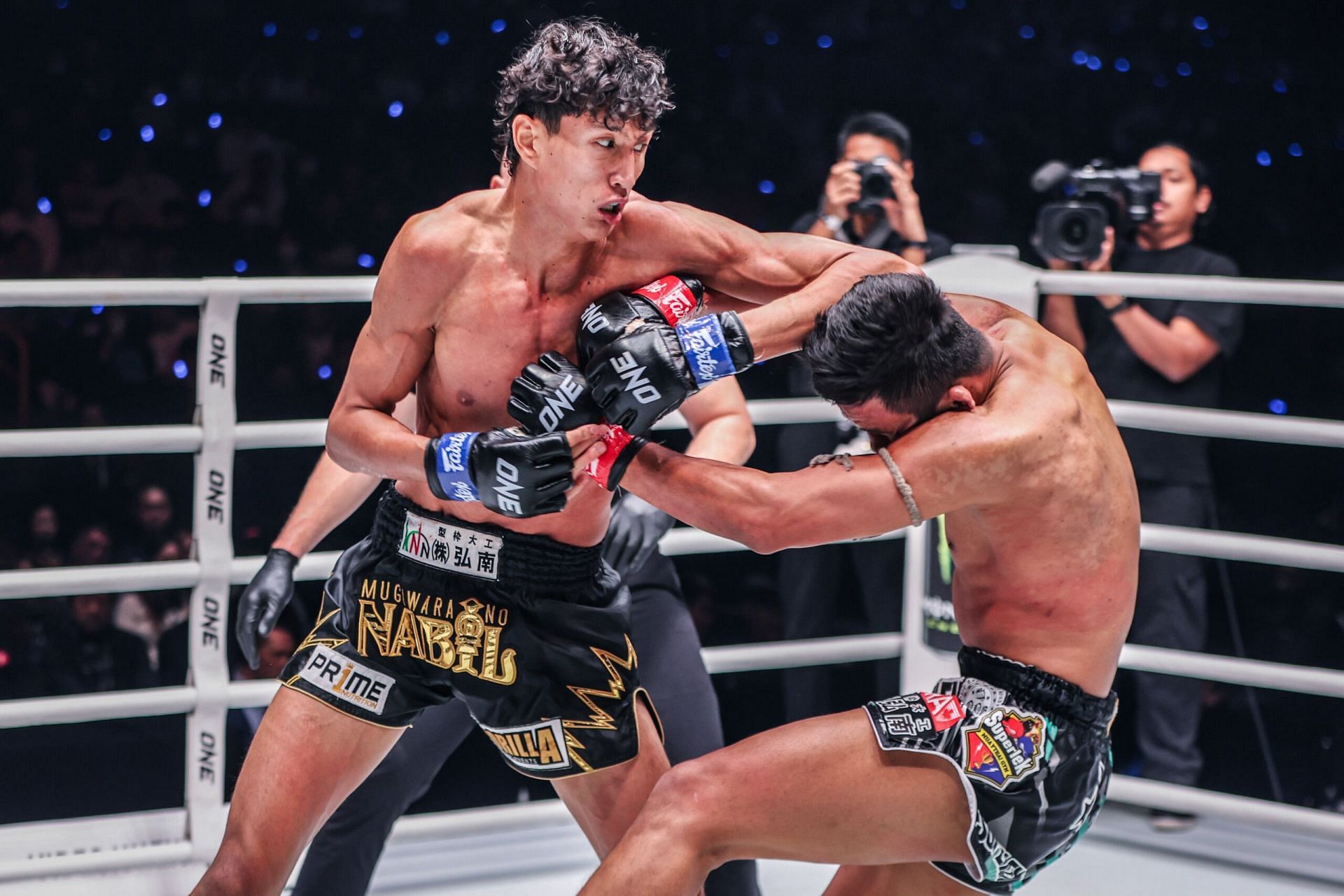 Nabil Anane (left) was in cruise control in his rematch vs Superlek Kiatmoo9 (right). [Image courtesy from ONE Championship]