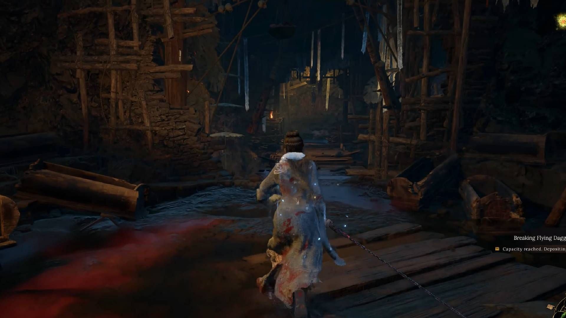 Caution of the swinging spike traps as you cross the wooden bridge in Wuchang: Fallen Feathers Cloudspire (Image via 505 Games || YouTube@Gamer&#039;s Little Playground)