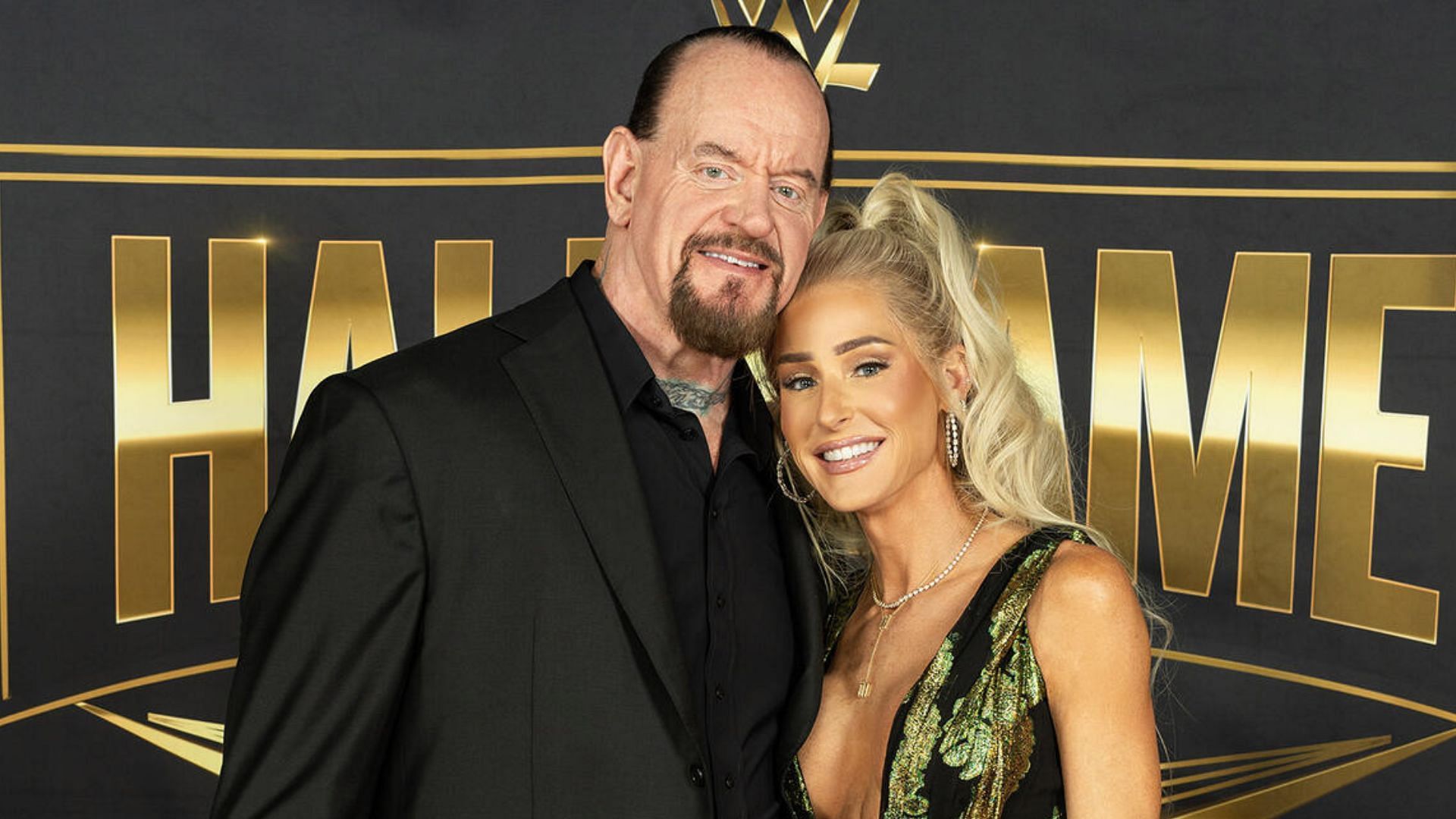 Undertaker and Michelle McCool at WrestleMania weekend! [Image credit: WWE.com]