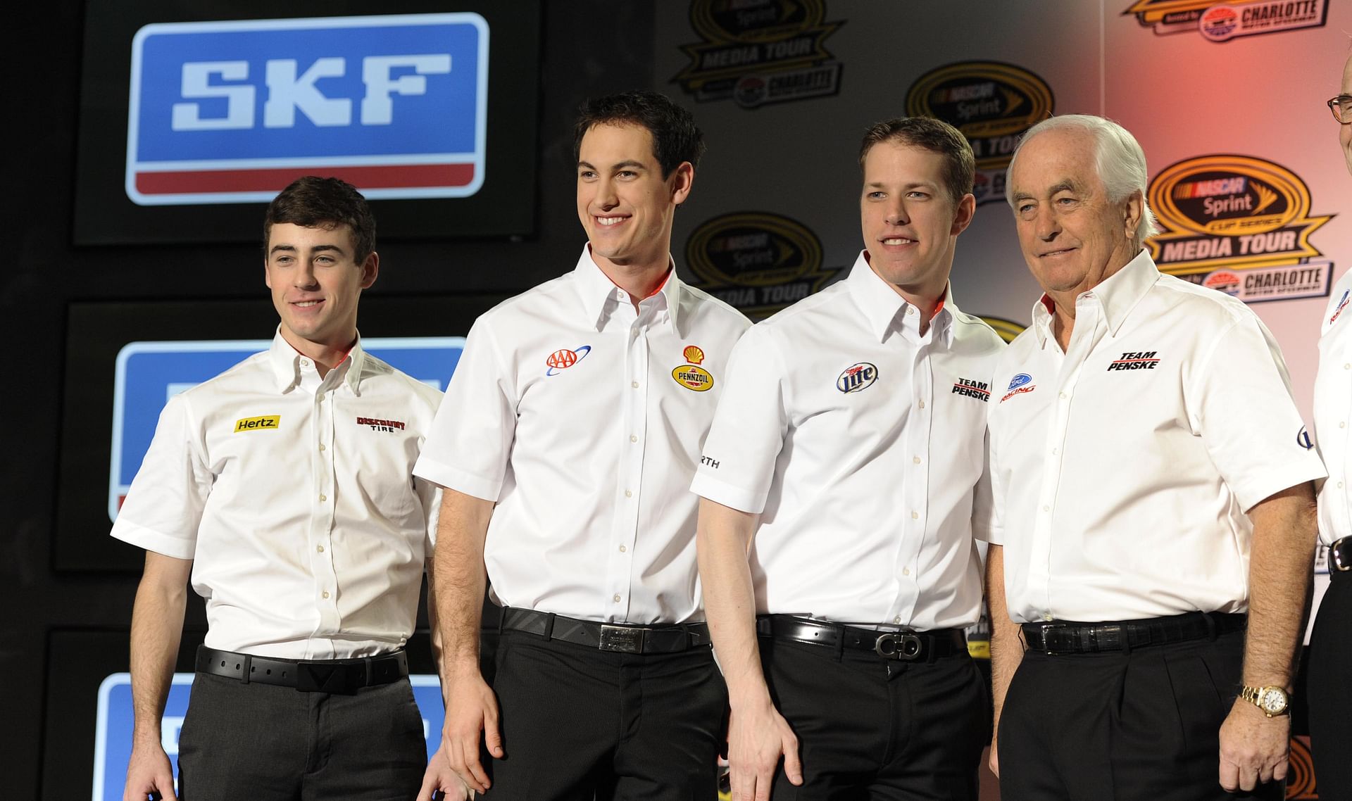 Team Penske drivers from (L-R) Ryan Blaney, Joey Logano, and Brad Keselowski with team owner Roger Penske at the 2014 Sprint Media Tour. Source: Imagn