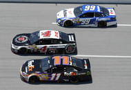 Denny Hamlin (11), Kevin Harvick (4), and Carl Edwards (99) at Talladega in 2014. Source: Imagn