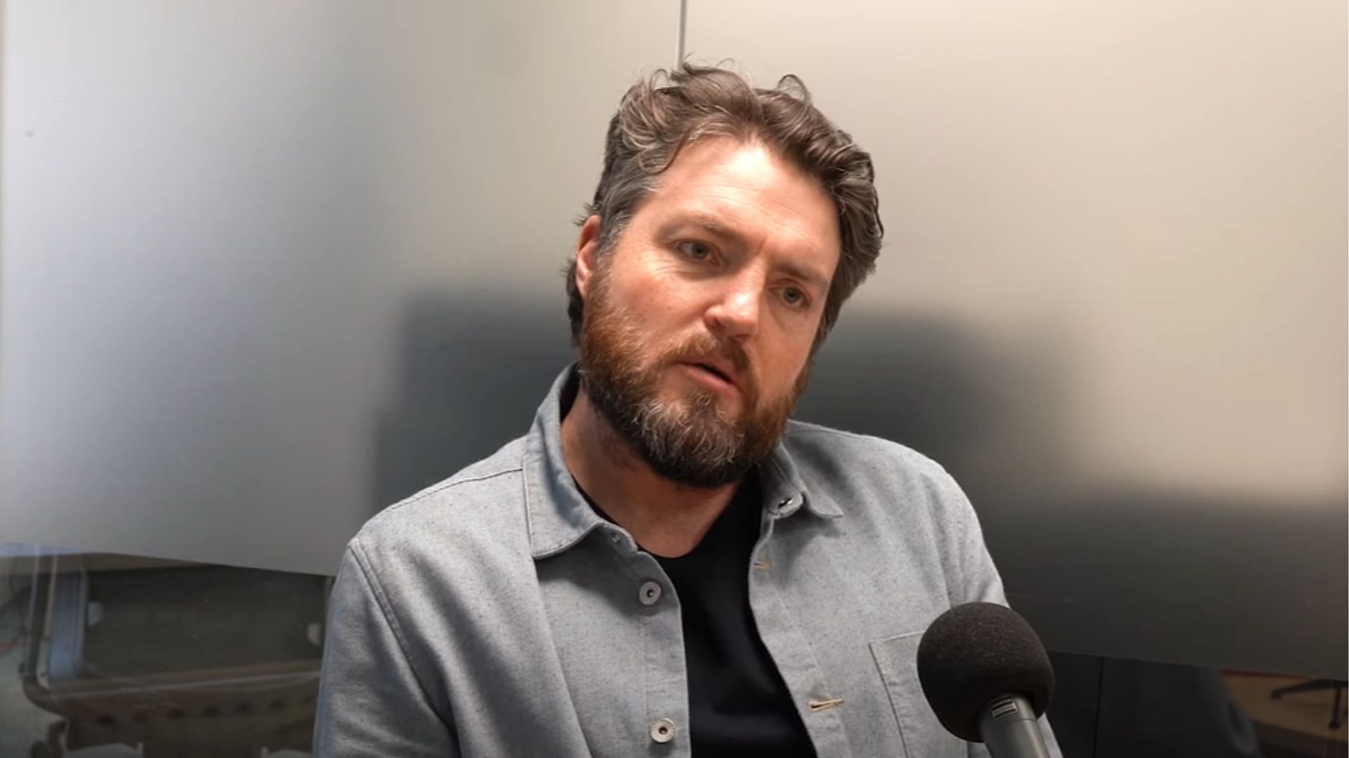 Tom Burke (Image via YouTube/ OfficialLondonTheatre)