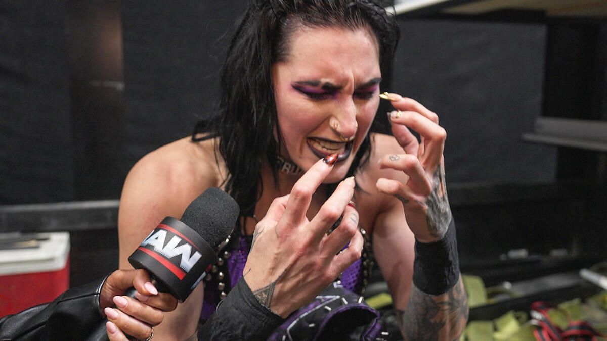 Rhea Ripley was forced to break character after pleading in pain with injury