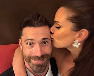 Erik Gudbranson shares selfie kiss with wife Sarah at Zach Werenski and Odette Peters' wedding reception