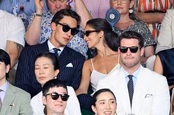 George Russell and girlfriend Carmen Mundt make a fashion statement as they watch Jannik Sinner battle it out against Carlos Alcaraz at Wimbledon