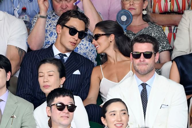 George Russell and girlfriend Carmen Mundt make a fashion statement as they watch Jannik Sinner battle it out against Carlos Alcaraz at Wimbledon