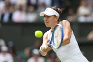 Belinda Bencic in action against Mirra Andreeva in the quarterfinals of the 2025 Wimbledon Championships (Source: Getty)