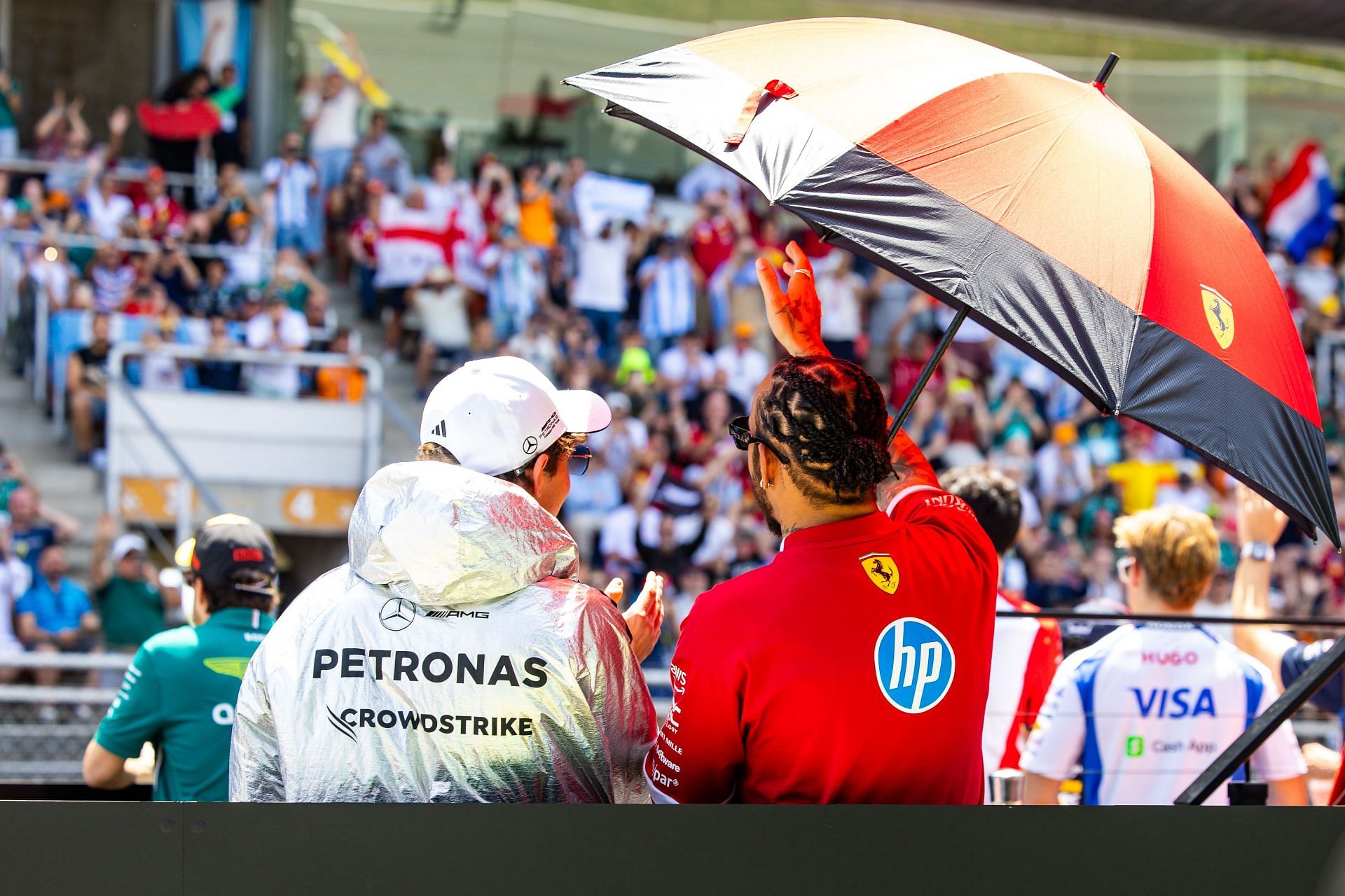 Lewis Hamilton (R) and Kimi Antonelli on the driver&#039;s parade in Spain. Source: Getty