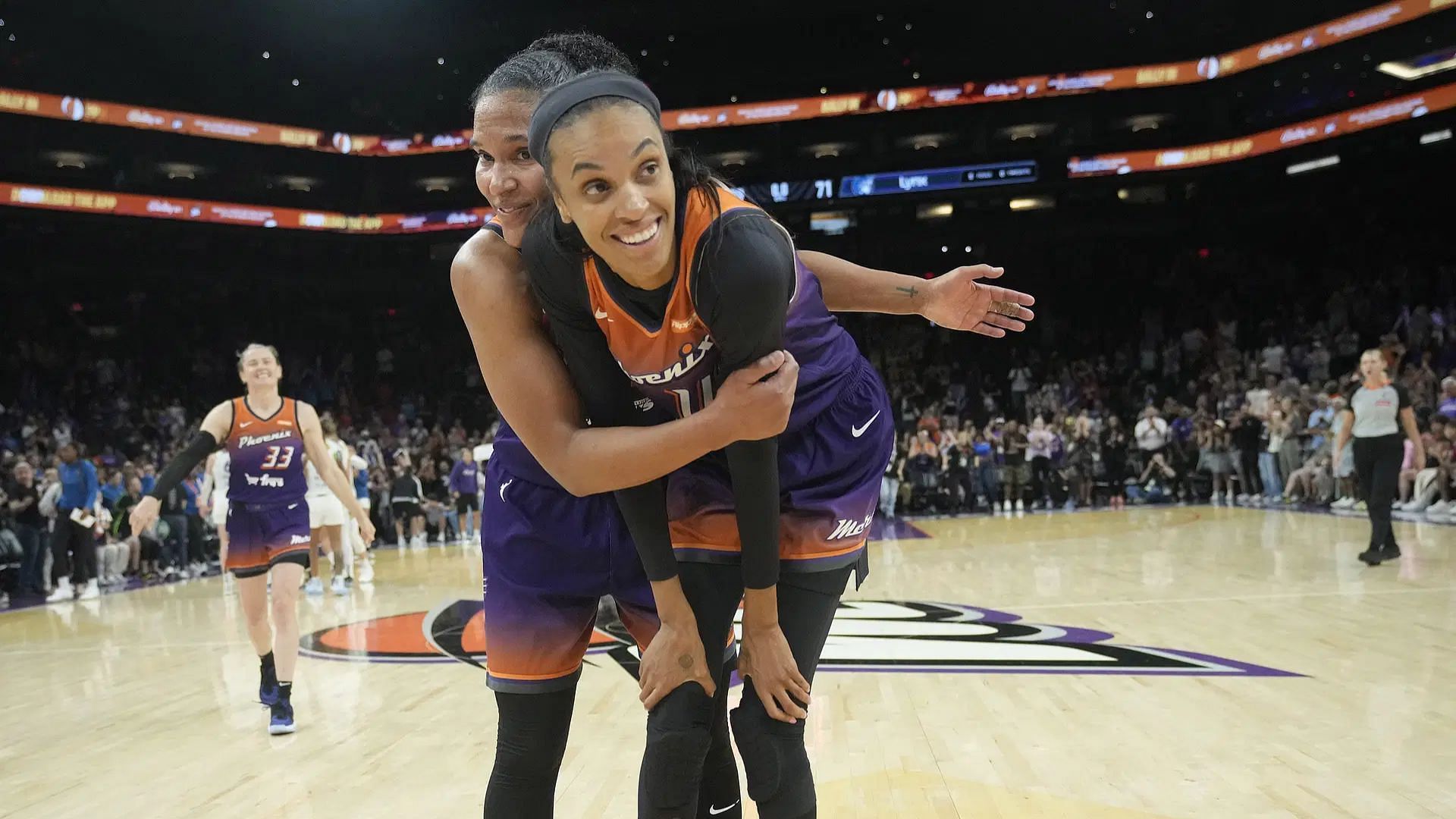 Alyssa Thomas glows with pride as Mercury fans embrace fianc&eacute;e DeWanna Bonner after Fever exit. (Photo: IMAGN)