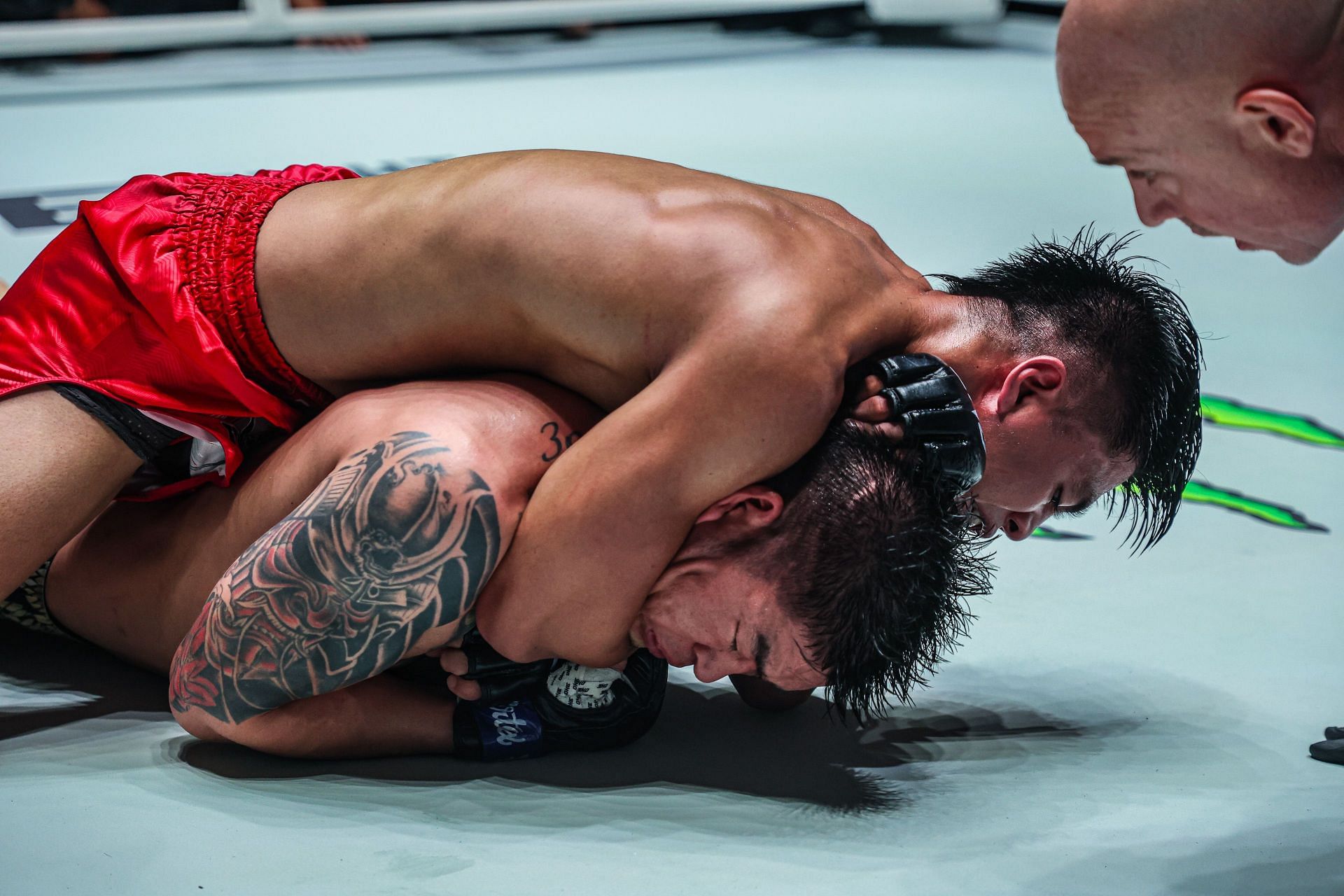 Jhanlo Mark Sangiao (top) finished Shinechagtga Zoltsetseg with a rear-naked choke at ONE Fight Night 33. [Image courtesy from ONE Championship]