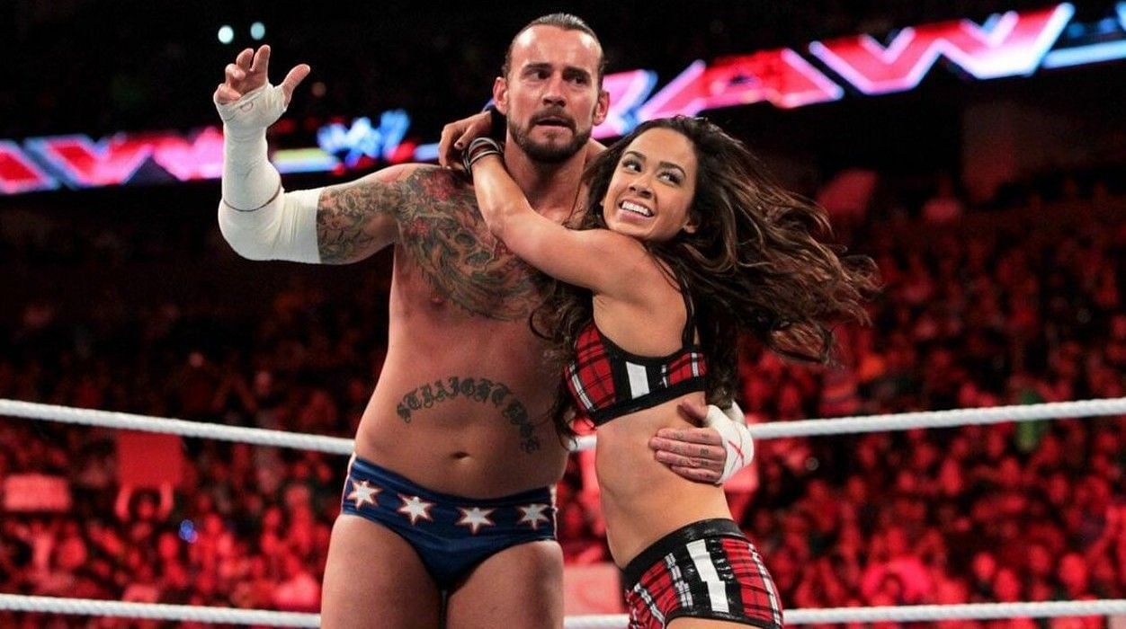 CM Punk and AJ Lee (Image Credits: wwe.com)