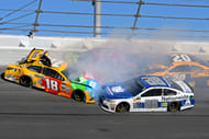 Dale Earnhardt Jr. (88) and Kyle Busch (18) wrecked during the 2017 Daytona 500. Source: Imagn
