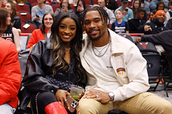 Simone Biles cheers husband Jonathan Ownes as he steps up for a good cause