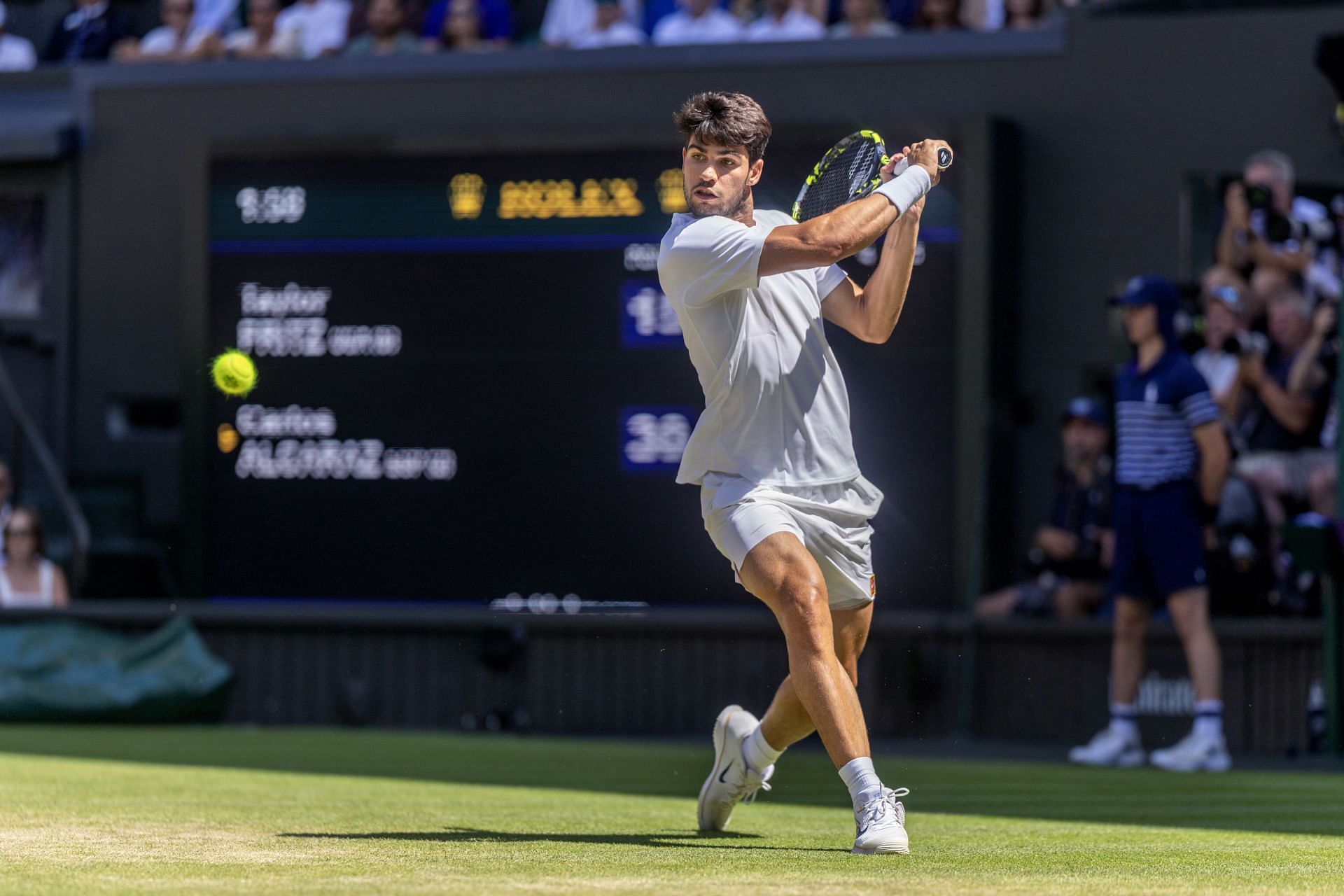 Alcaraz in action at The Championships - Wimbledon 2025. - Source: Getty