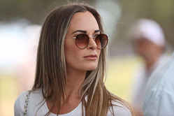 Jena Sims flaunts backless black dress in Portugal as Brooks Koepka prepares for event in Andalucia