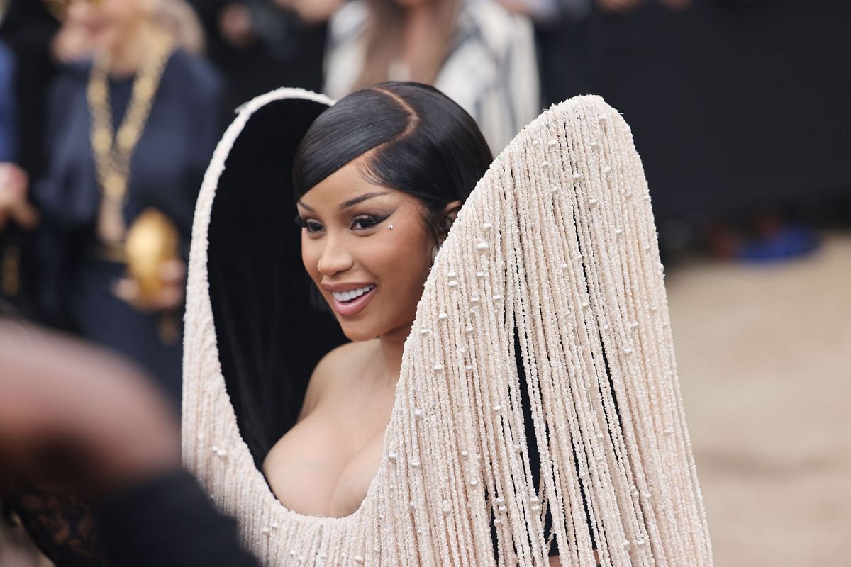 "Not the bird being an accessory" — Internet reacts to Cardi B shushing the paparazzi to not upset a crow she carried at the Schiaparelli show