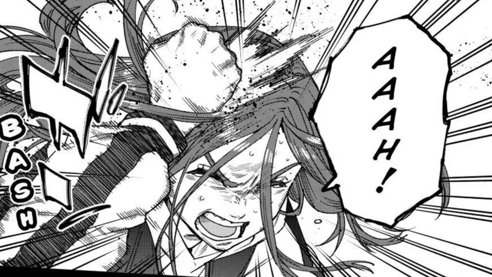 Kotoha starts hitting herself in frustration in Wind Breaker chapter 186 (Image via Kodansha)